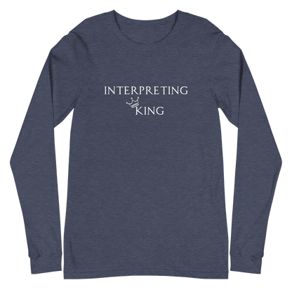 Blue long sleeve shirt with white text "Interpreting King" with a small crown on top of the letter K in King.